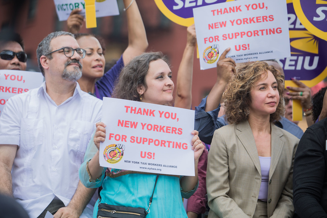 Bhairavi Desai (center), executive director of the New York Taxi Workers Alliance.